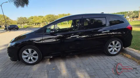 2015 Honda Civic Oriel photo 4